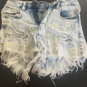 High waisted jean shorts with daises